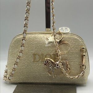 Dior limited edition clutch/Crossbody gold bag with charm